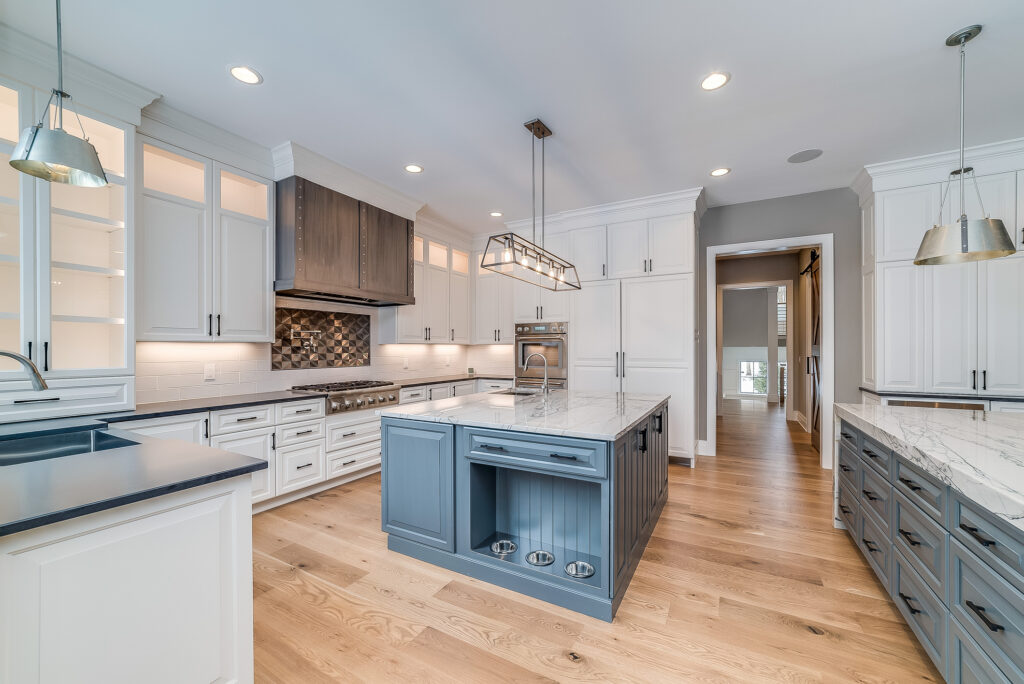 Kitchen with a large island in a newly built Colorado home