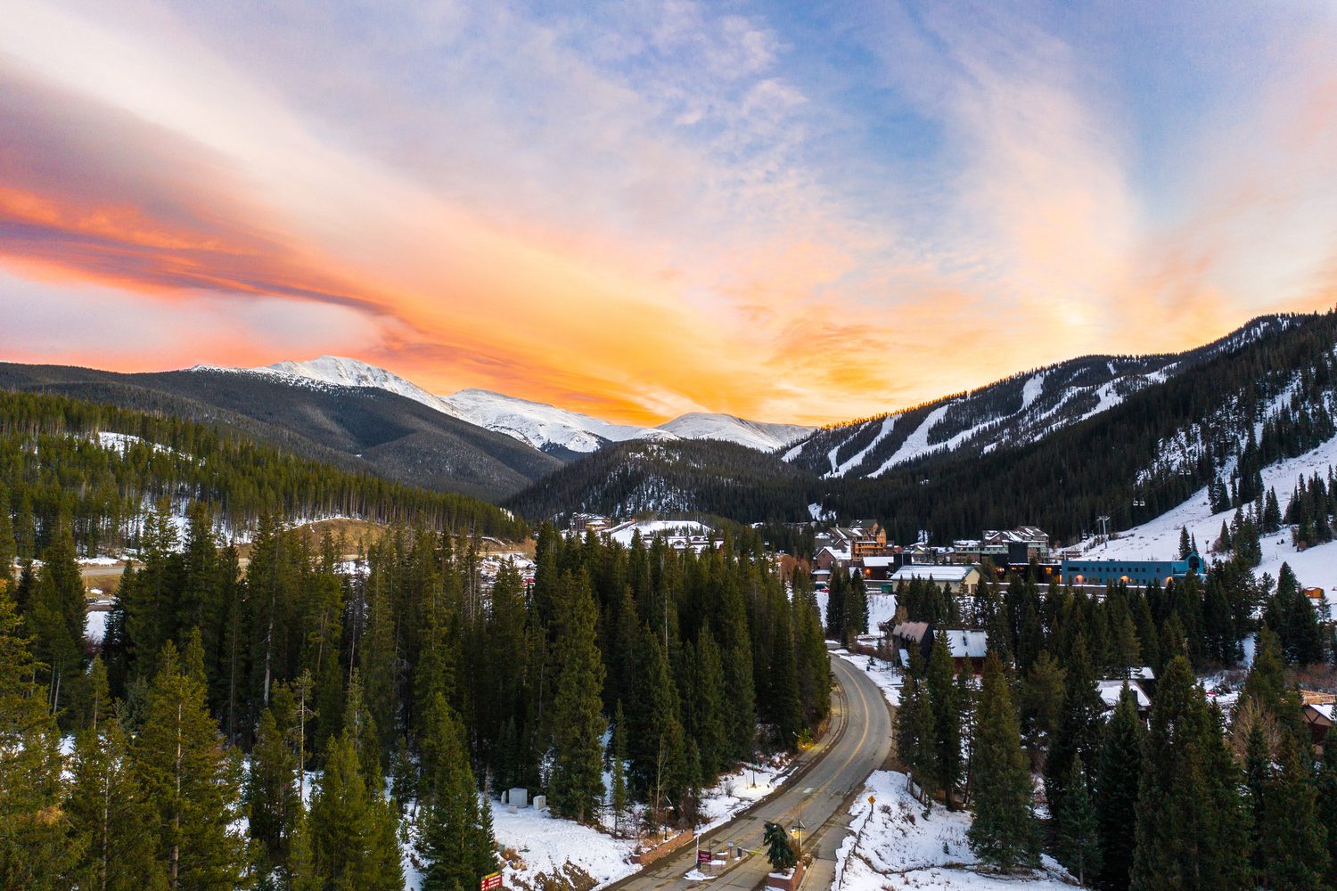 Snow covered mountain valley above Winter Park, Colorado at sunset